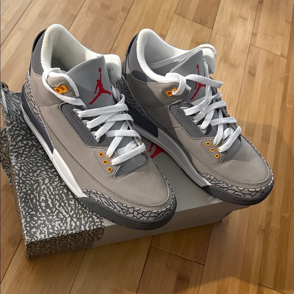 Jordan Gray and White Sneakers with Red Accents
